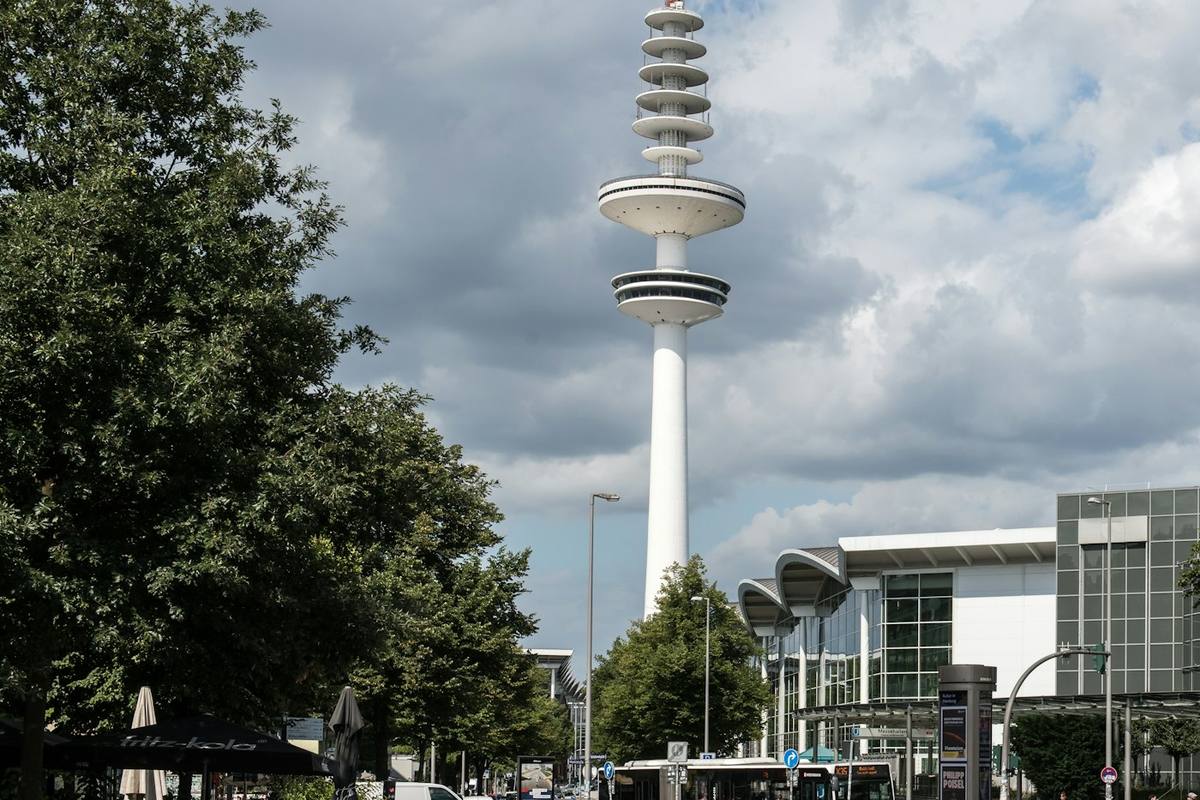 Street near Dammtor station with trees and the TV tower